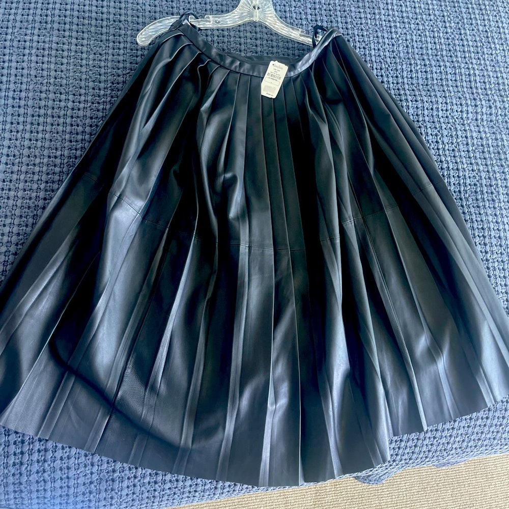 Cusp by Neiman Marcus pleated knee length leather skirt. New with tags.